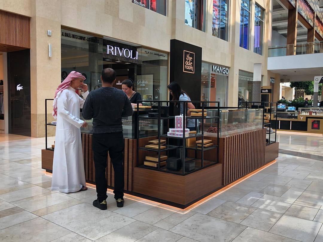 Date Room kiosk Galleria Mall Abu Dhabi | ARC Design wooden and glass retail counter