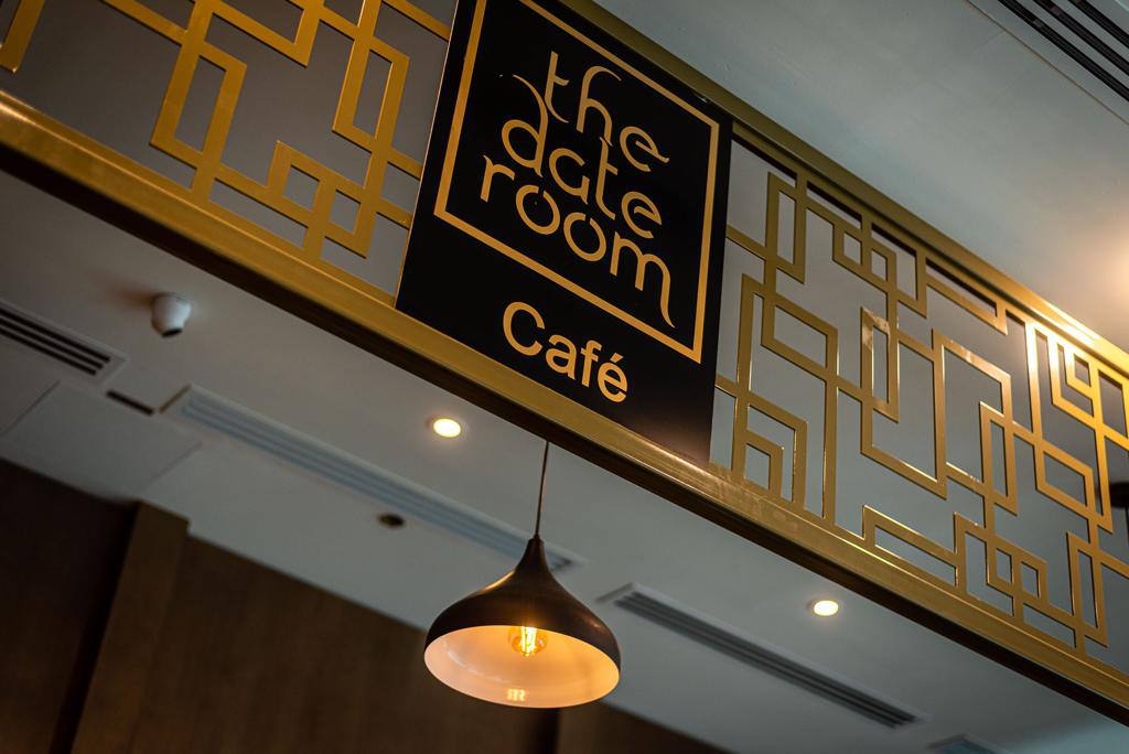 ARC Design – The Date Room Café logo and decorative entrance design at Alforsan Mall, Abu Dhabi