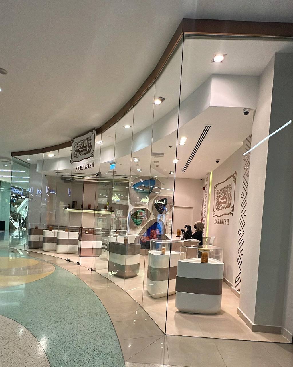 Zarakish Dubai – Deira City Center | Modern glass facade with retail interior design