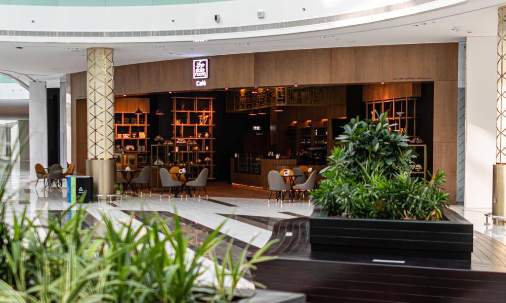 ARC Design – Date Room Café exterior view with seating area at Alforsan Mall Abu Dhabi